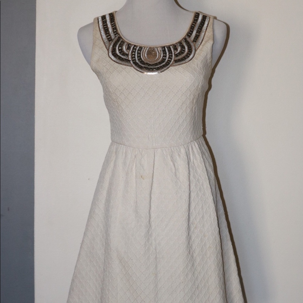Cream and gold dress